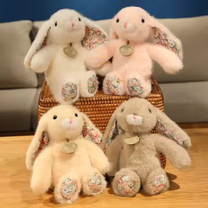 Cuddle Bunny Plush™